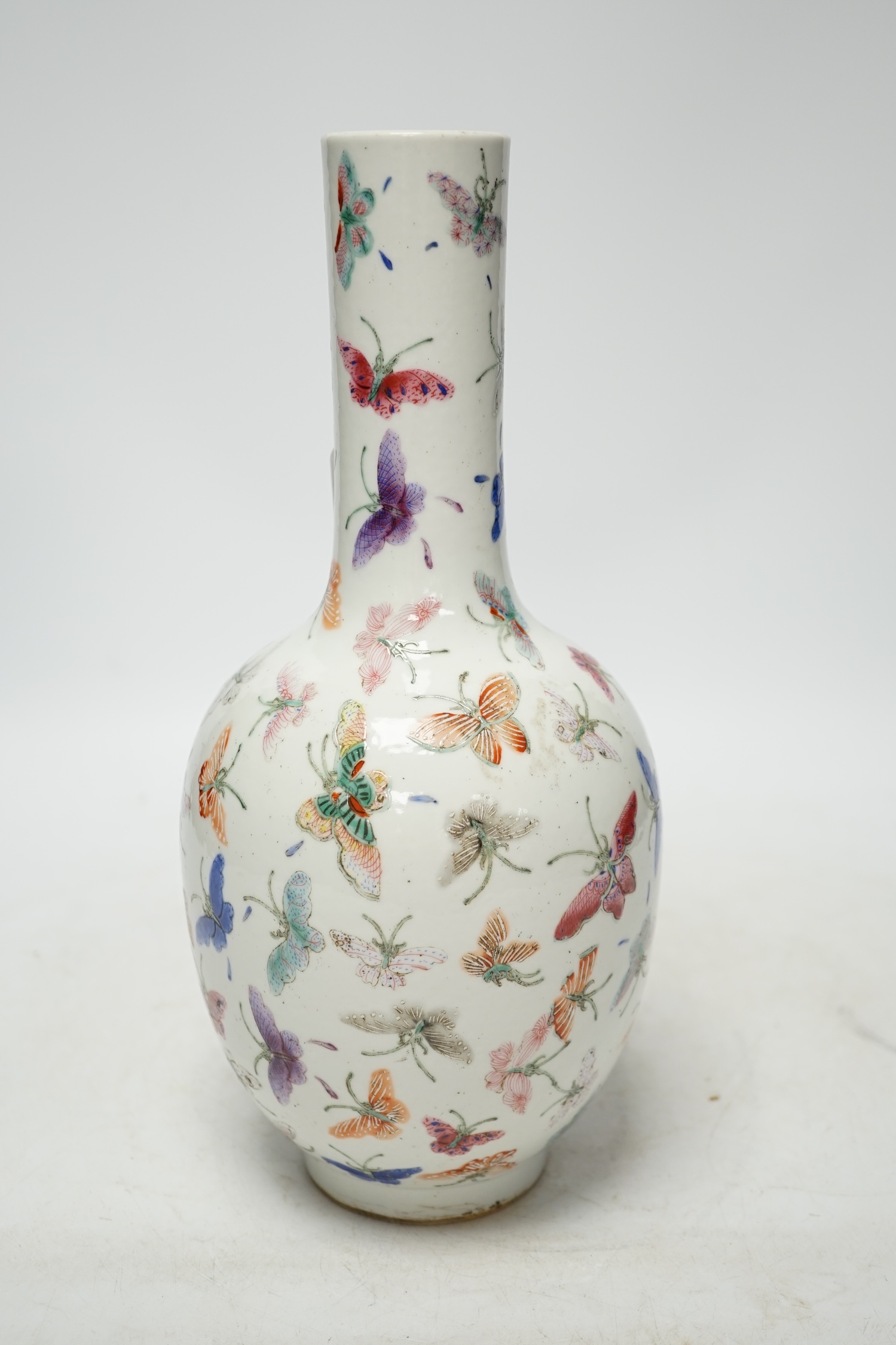 A Chinese famille rose ‘butterflies’ vase, 29cm high. Condition - good, light scratches to footrim, otherwise good. Guangxu marks